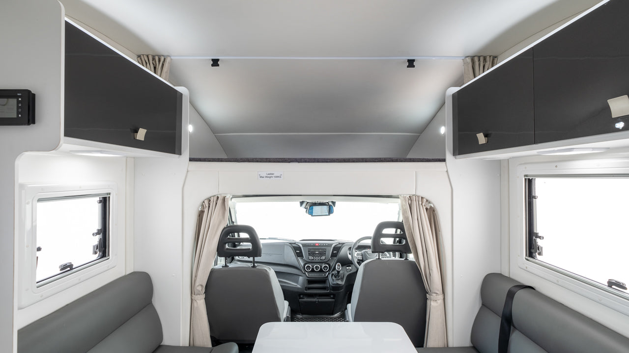 Winnebago Iluka view of front cabin and dinette