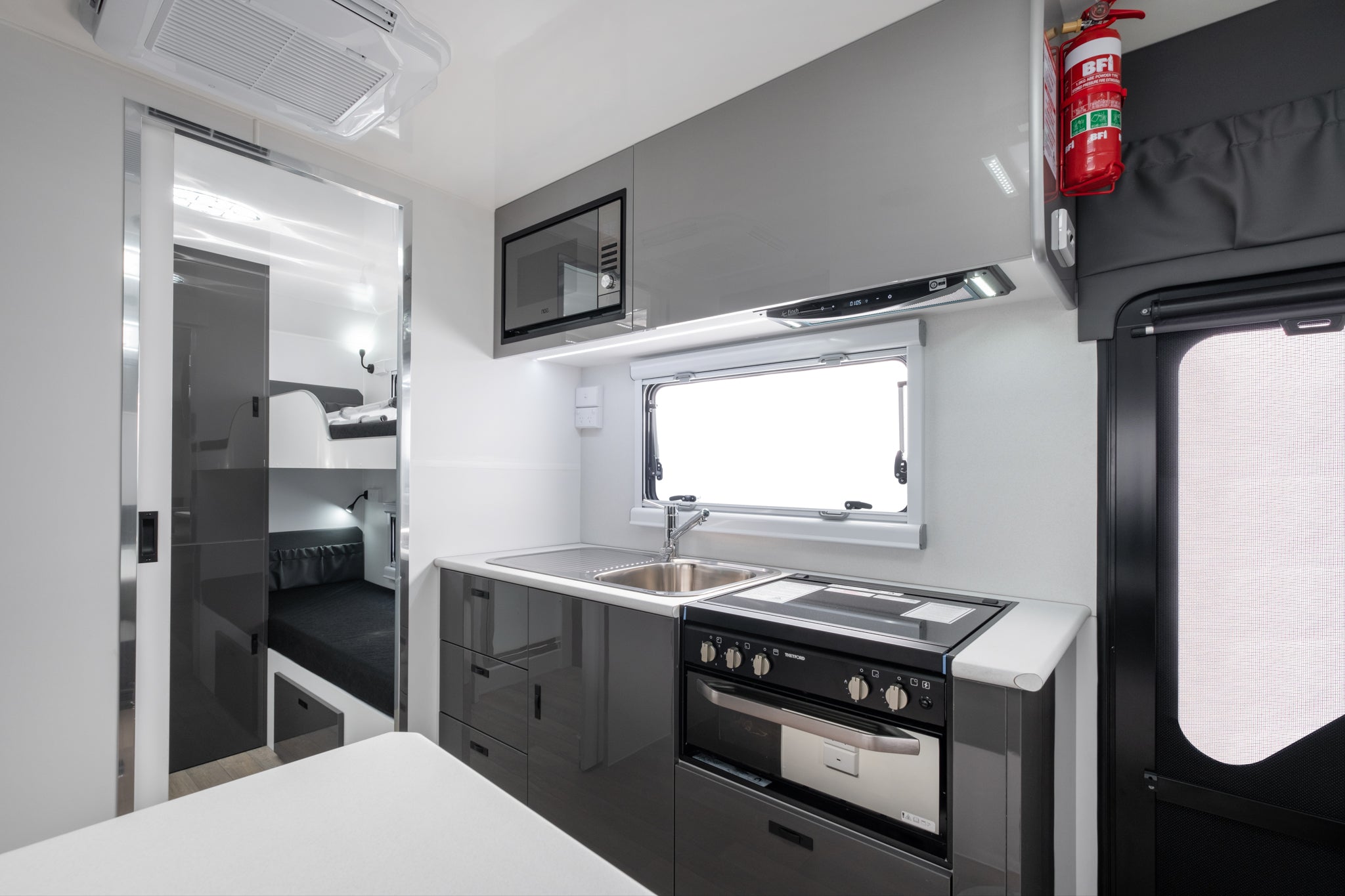 Coromal Thrill Seeker 18'6 Family caravan kitchen and kids bedroom view