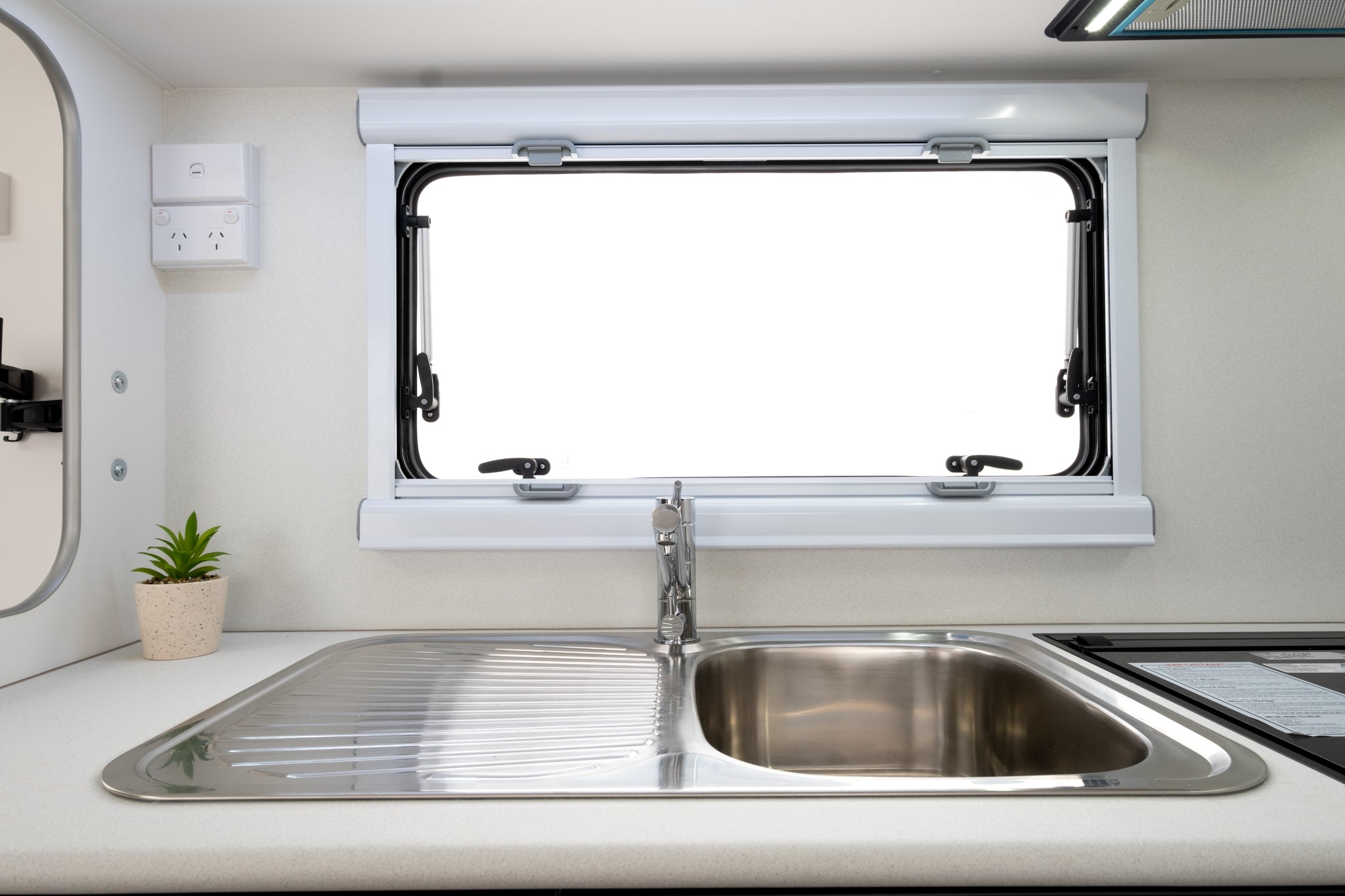 Coromal Thrill Seeker 18 Couples kitchen sink and window