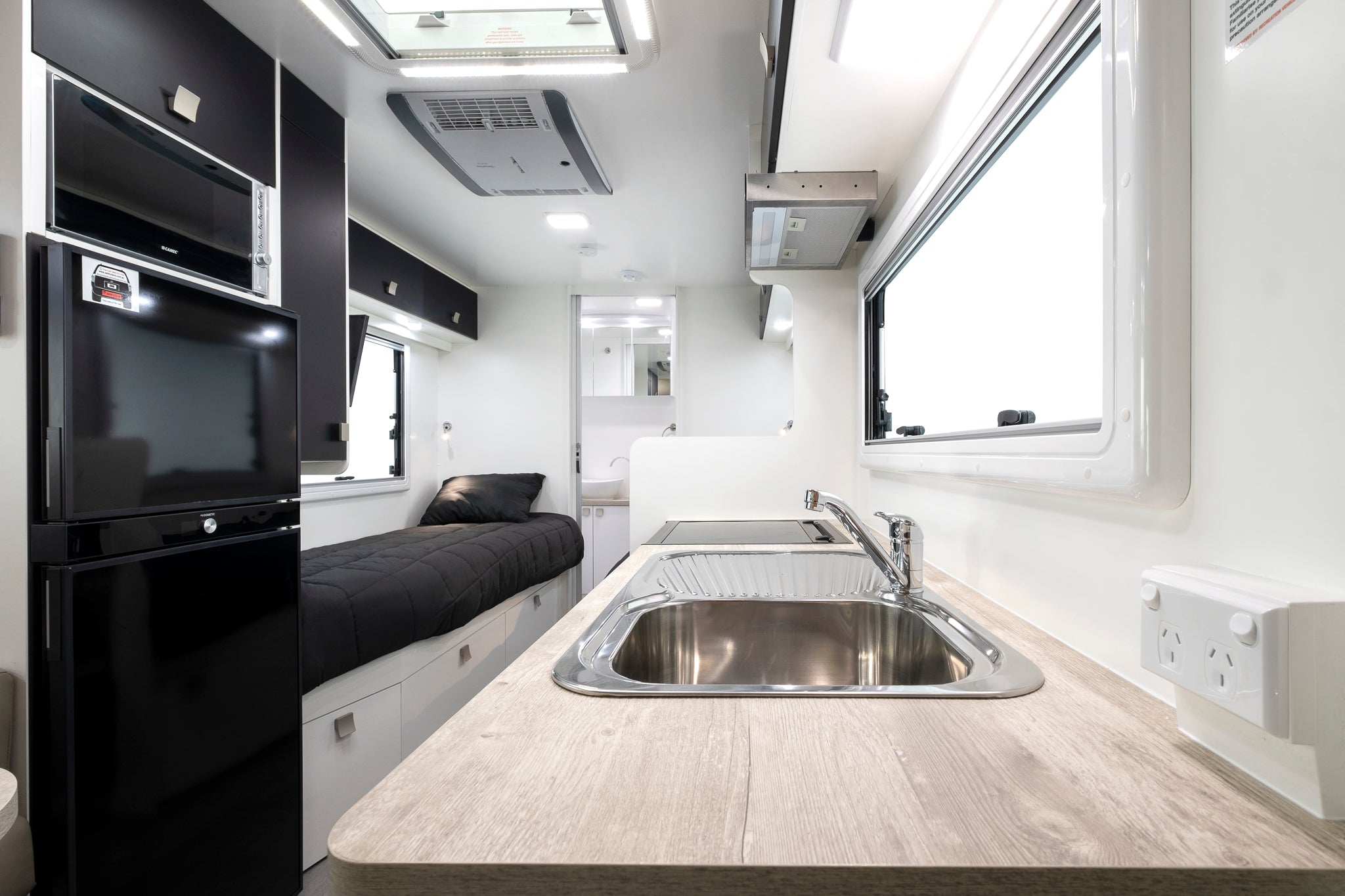 Winnebago Jervis kitchen and single bed