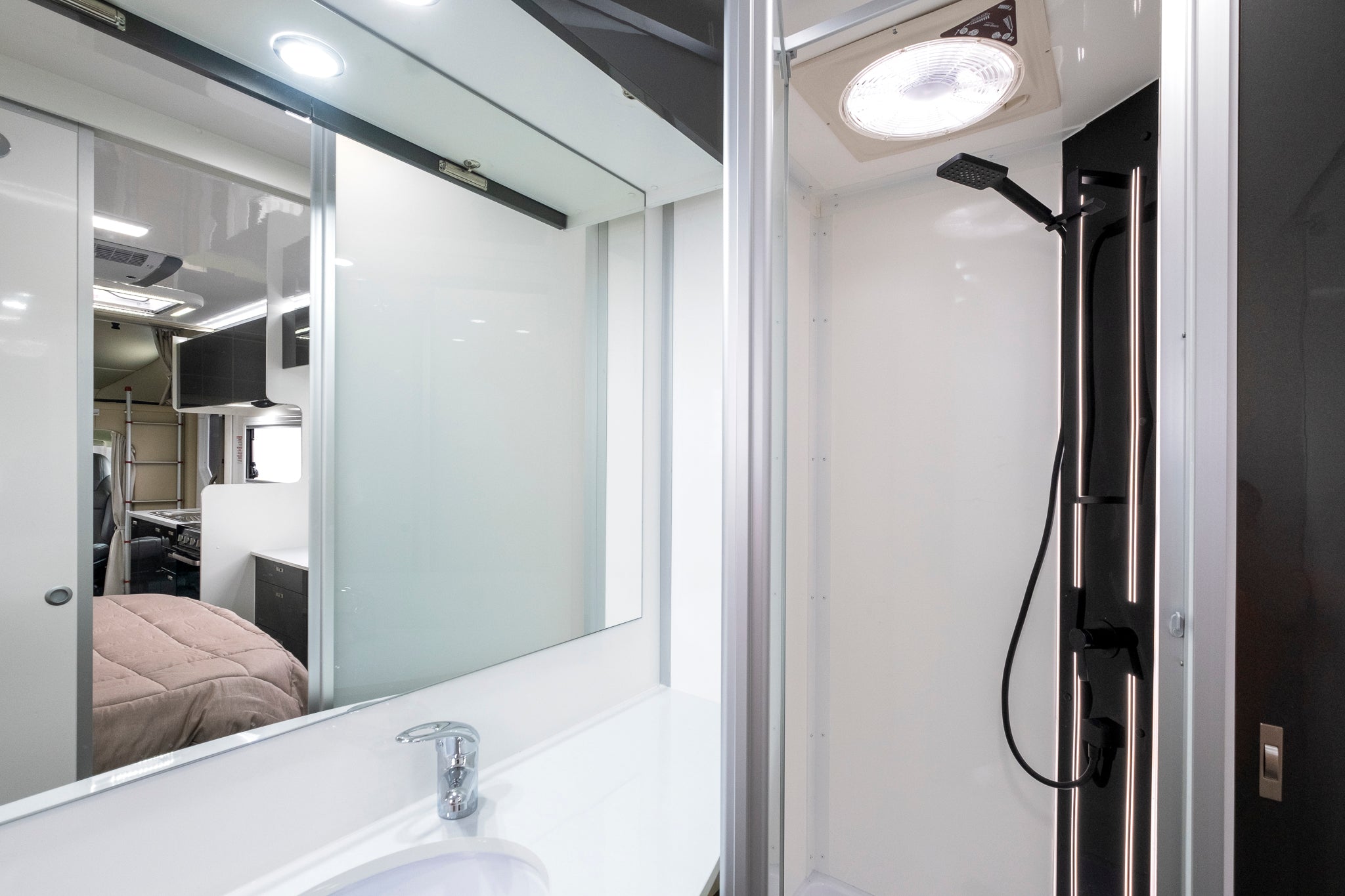 Windsor Simpson Motorhome Shower and Bed View