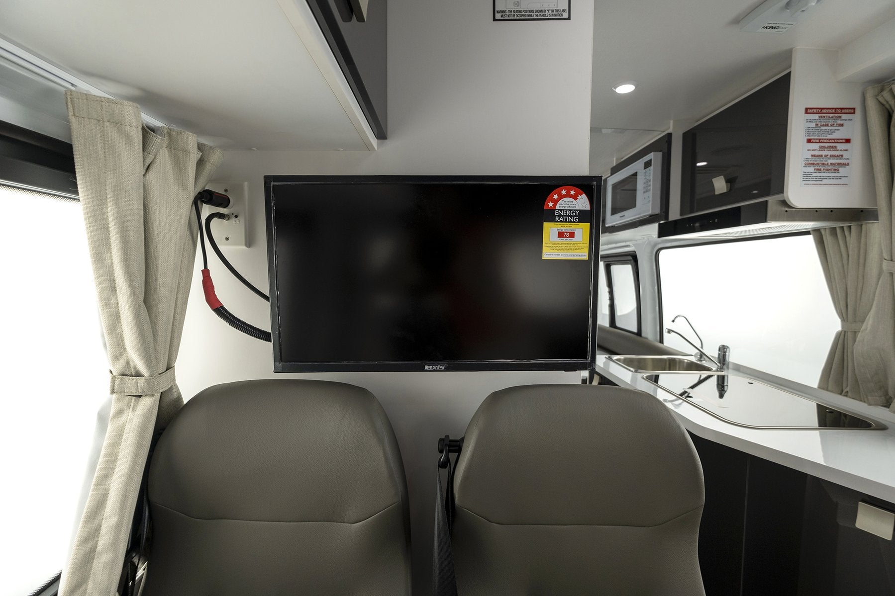 Winnebago Bondi 4S Metallic Grey Seats with television