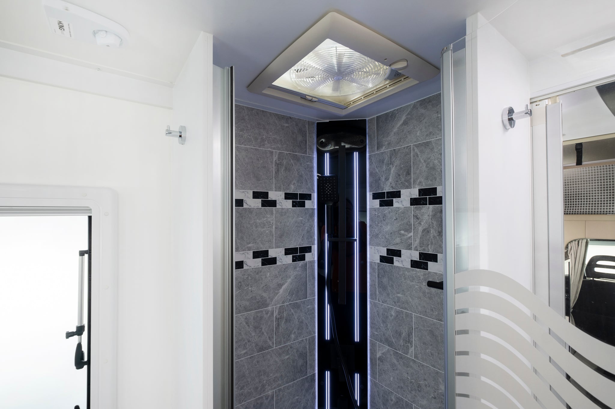 Winnebago Iluka shower with extractor fan and feature lighting