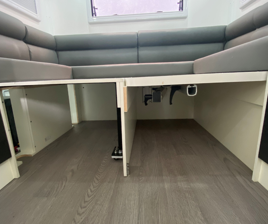 under rv rear bed