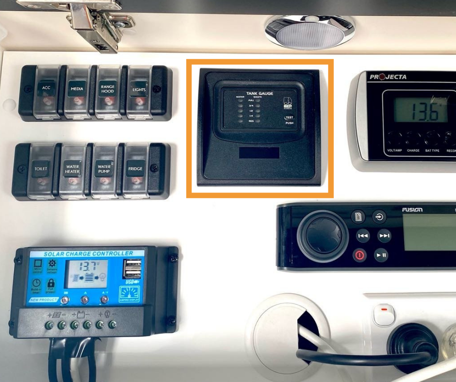 rv mains power board showing water tank monitor